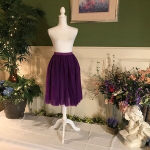 Mid length purple tulle skirt